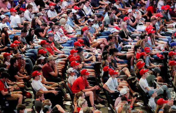 Young unmasked and undistanced supporters listen to President Trump in Phoenix, AZ.