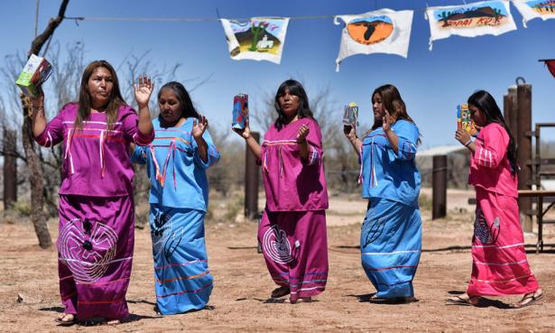      Indigenous people from the Tohono O’odham ethnic group dance and sing