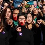 women demonstrating against rape